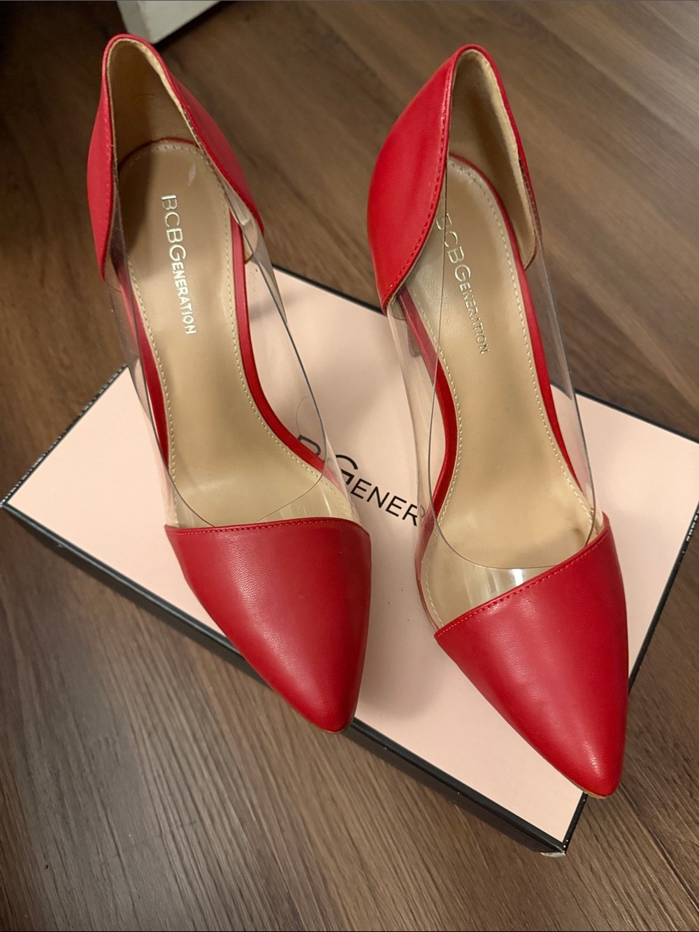 BCBGeneration Red Pointed-Toe Clear Panel Pumps